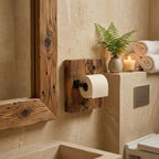 Uchwyt na papier toaletowy zamontowany na scianie lazienki